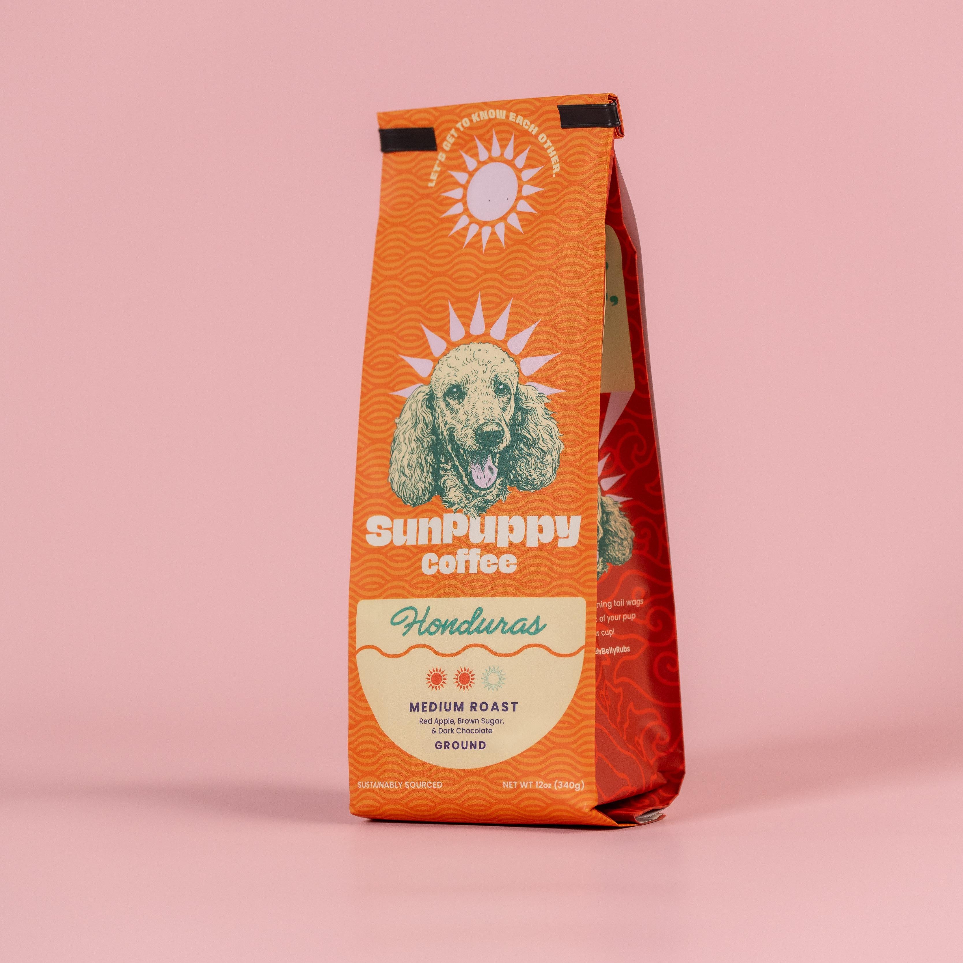 SunPuppy Coffee Honduras bag on a pink background