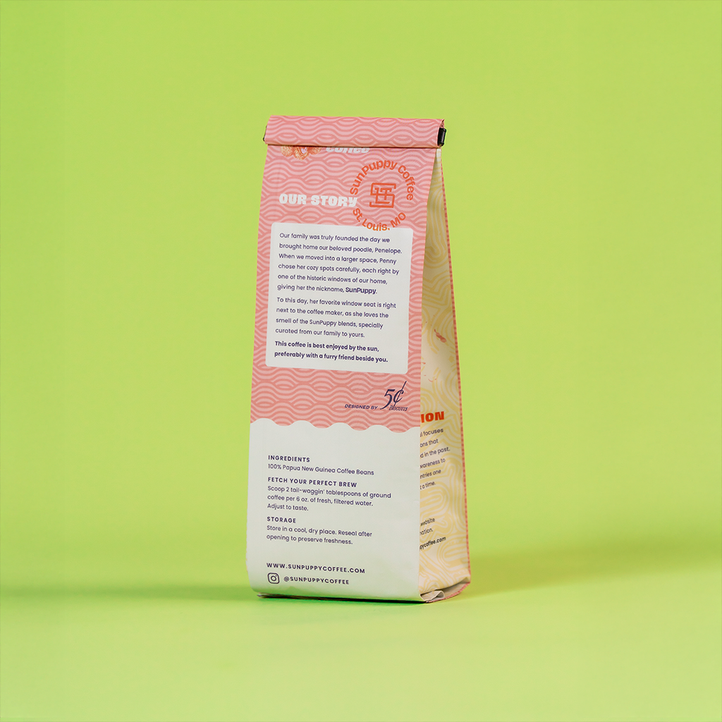 Sunpuppy Coffee bag back view displaying Our Story text, brewing instructions, 100% PNG beans info, and company contact details on pink design